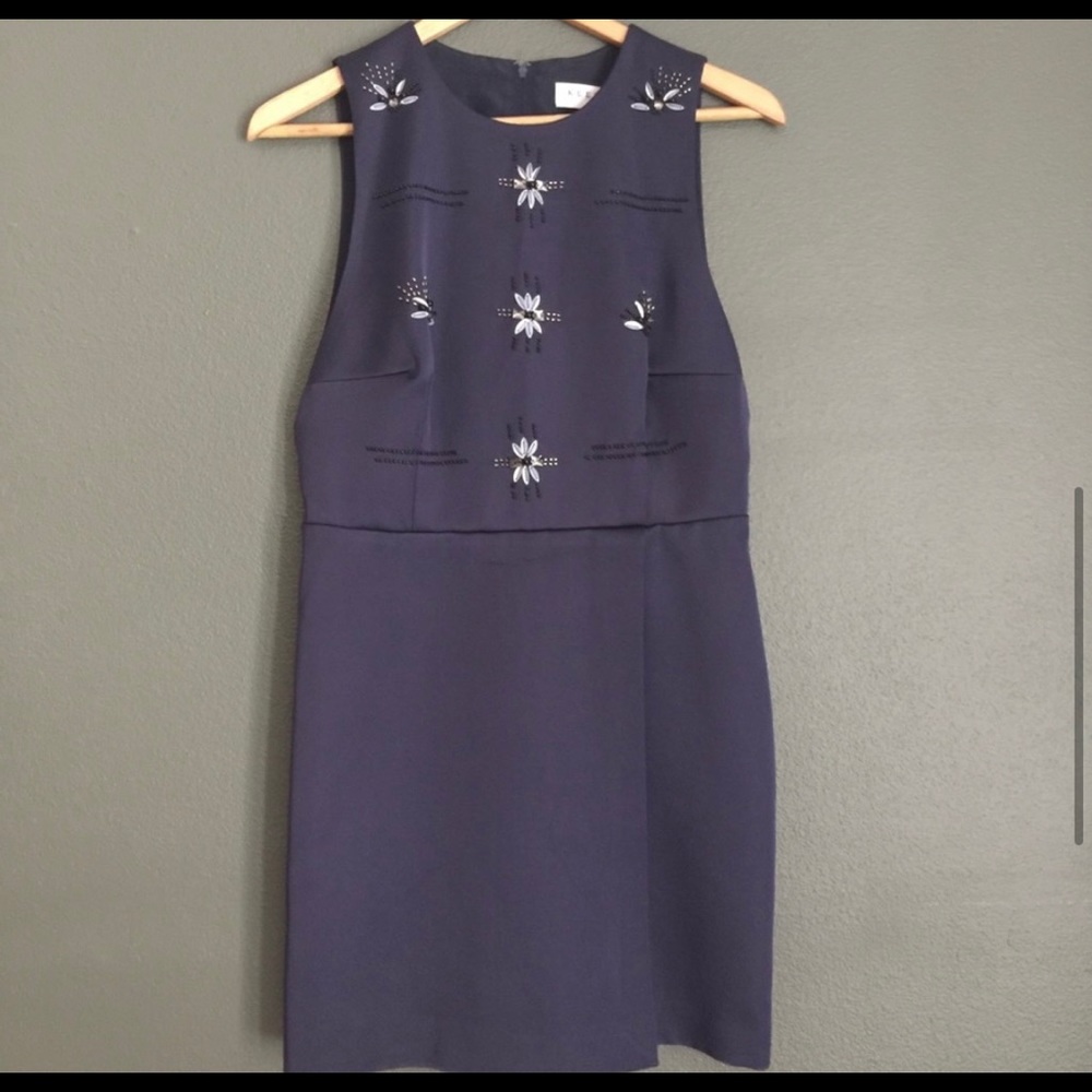 Keepsake. NWT, navy/purple embellished with jewels and beads on the front.